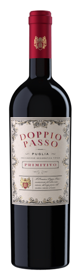 A bottle of Doppio Passo Primitivo wine, elegantly designed with a cream label and a striking red cap.
